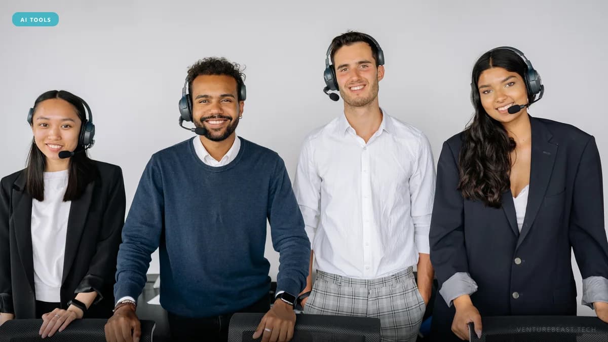 Four smiling customer support agents wearing headsets stand side by side at their desks