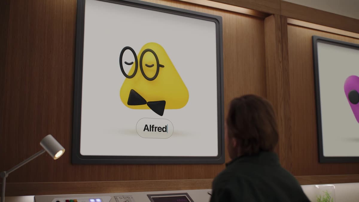 Alfred, a yellow OpenAI Dot character with round glasses and a bow tie, shown on a screen with his name typed below